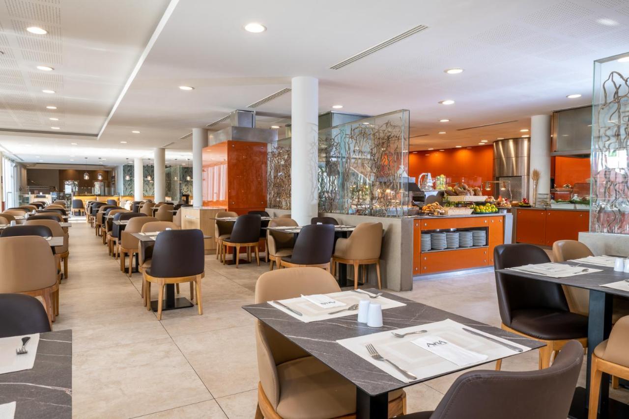 Aria Hotel Eilat Buitenkant foto The restaurant