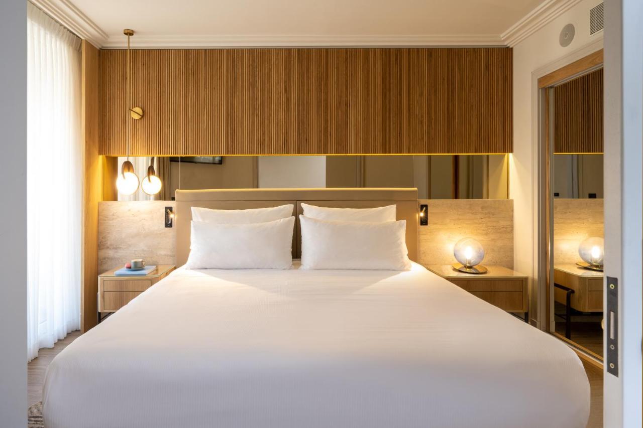 Aria Hotel Eilat Buitenkant foto A bedroom at the hotel